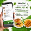 Un burger cu cartofi prajiti si o portie de 4 bucati de crispy strips crocante cu cartofi prajiti